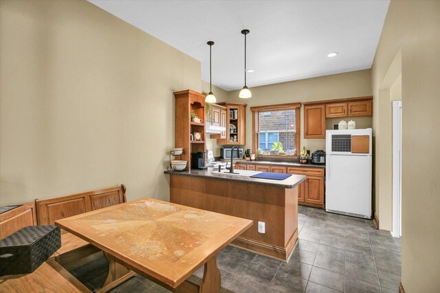 201 W Yates, Newman, IL 61942 - kitchen featuring freestanding refrigerator, dark countertops, a peninsula, open shelves, and recessed lighting