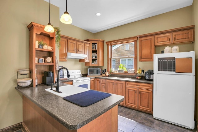 201 W Yates, Newman, IL 61942 - kitchen with white appliances, under cabinet range hood, dark countertops, open shelves, and a peninsula