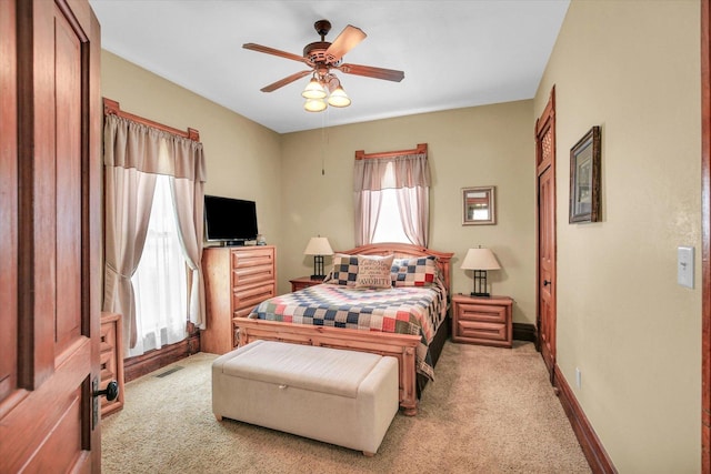 201 W Yates, Newman, IL 61942 - bedroom featuring light colored carpet and a ceiling fan