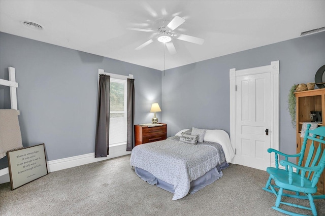 201 W Yates, Newman, IL 61942 - bedroom featuring carpet floors and a ceiling fan