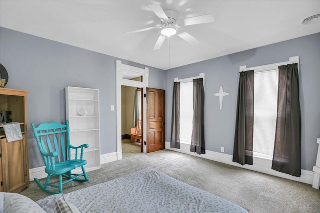 201 W Yates, Newman, IL 61942 - carpeted bedroom featuring baseboards and a ceiling fan