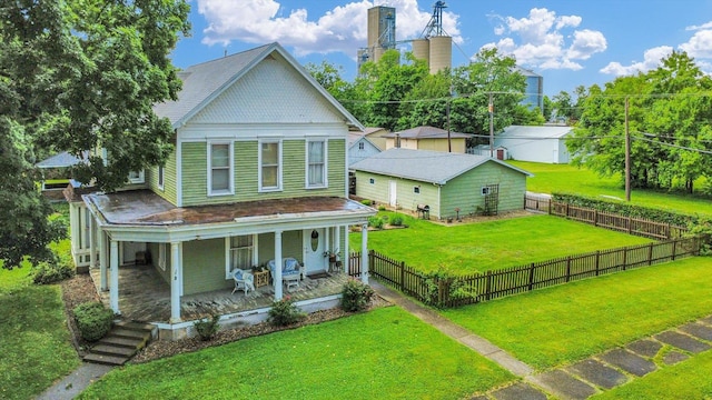 201 W Yates, Newman, IL 61942 - view of front of home featuring a porch and a fenced backyard