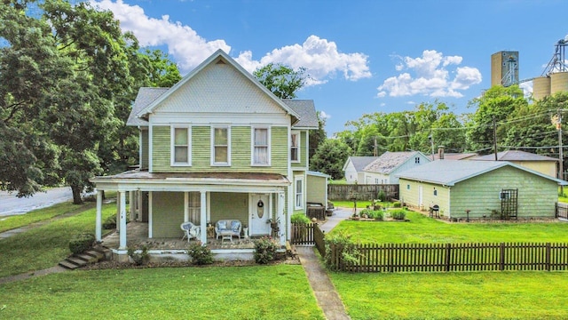 201 W Yates, Newman, IL 61942 - victorian-style house featuring covered porch