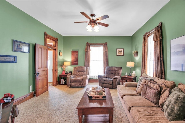201 W Yates, Newman, IL 61942 - living area featuring a ceiling fan and carpet flooring