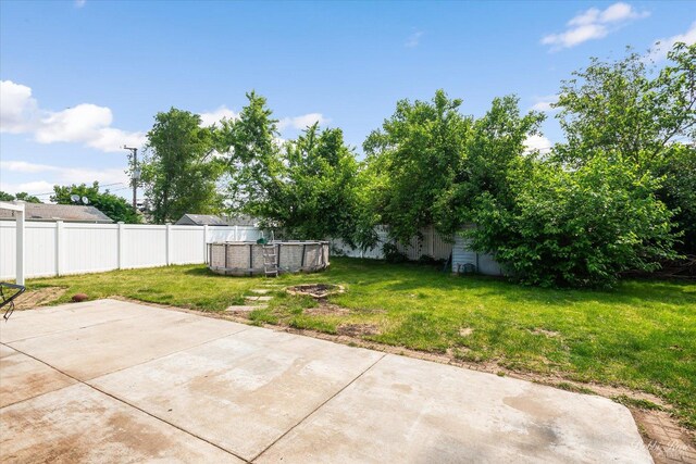 413 Glen Ave, Romeoville, IL 60446 - fenced backyard featuring a patio