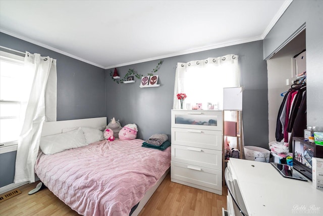 413 Glen Ave, Romeoville, IL 60446 - bedroom featuring light wood-style flooring and crown molding