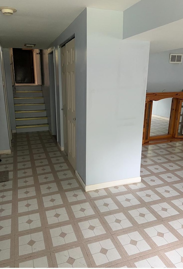301 N Stevenson Ln, Mount Prospect, IL 60056 - corridor featuring light floors and stairs