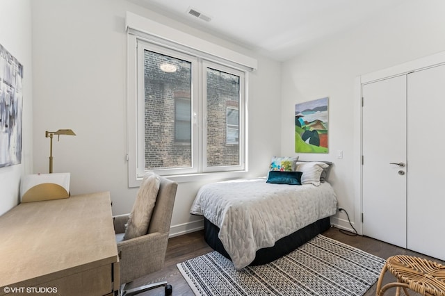 2138 N Sawyer Ave Unit 2, Chicago, IL 60647 - bedroom featuring wood finished floors and baseboards