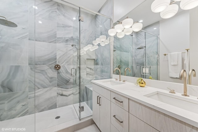 2138 N Sawyer Ave Unit 2, Chicago, IL 60647 - bathroom with a shower stall and double vanity