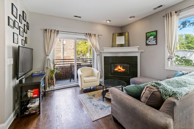 2656 N Hamlin Ave Unit 1W, Chicago, IL 60647 - living room featuring dark wood-style floors and a fireplace