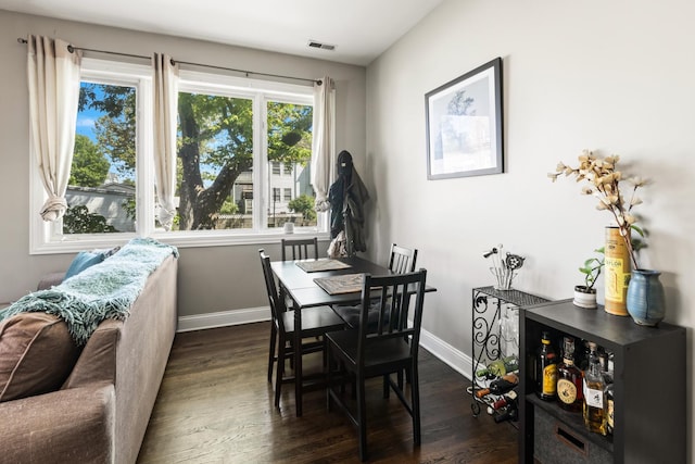 2656 N Hamlin Ave Unit 1W, Chicago, IL 60647 - dining room featuring dark wood-type flooring