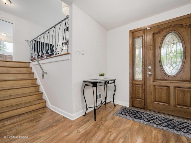 18902 Jonathan Ln, Homewood, IL 60430 - entryway featuring stairway and light wood finished floors