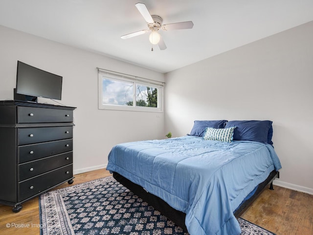 18902 Jonathan Ln, Homewood, IL 60430 - bedroom with light wood finished floors and ceiling fan