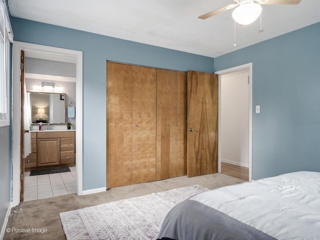 18902 Jonathan Ln, Homewood, IL 60430 - bedroom with light colored carpet, a closet, ensuite bath, and ceiling fan
