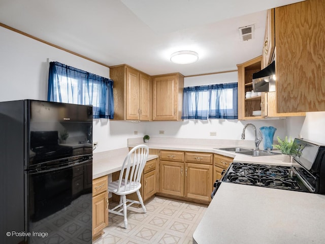 18902 Jonathan Ln, Homewood, IL 60430 - kitchen featuring freestanding refrigerator, gas stove, wall chimney range hood, light countertops, and light flooring
