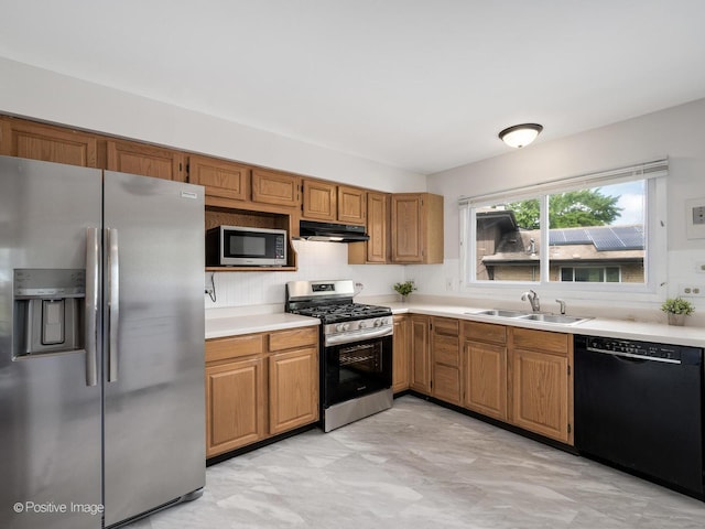 18902 Jonathan Ln, Homewood, IL 60430 - kitchen featuring stainless steel appliances, under cabinet range hood, light countertops, and brown cabinetry