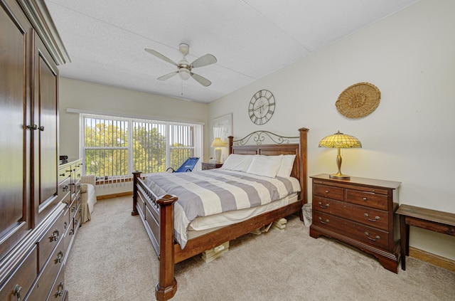 7050 183rd St Unit 409, Tinley Park, IL 60477 - bedroom with light colored carpet and ceiling fan