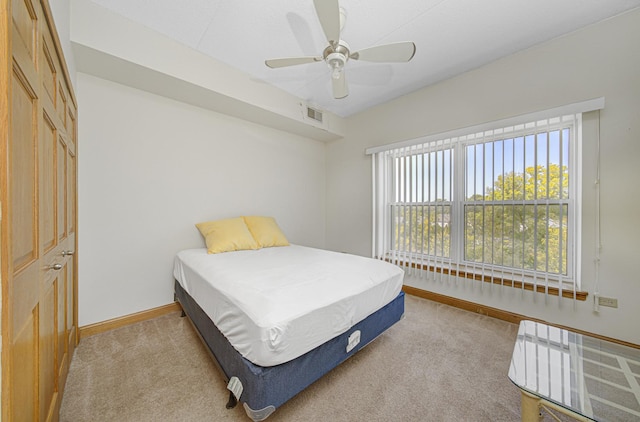 7050 183rd St Unit 409, Tinley Park, IL 60477 - bedroom with carpet and a ceiling fan