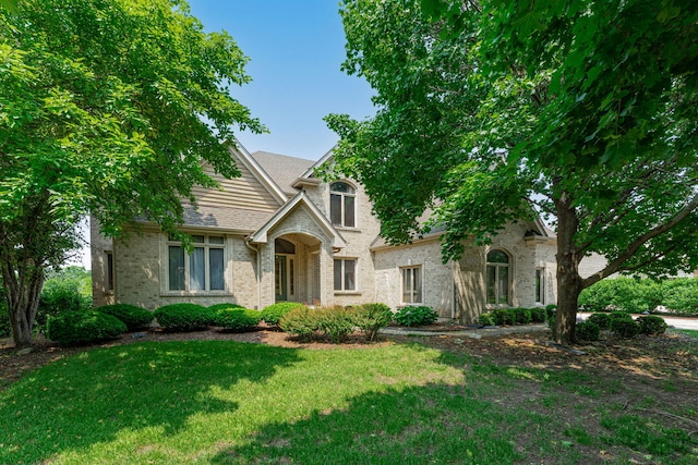 552 Waters Edge Dr, South Elgin, IL 60177 - view of front of property with a front lawn and brick siding