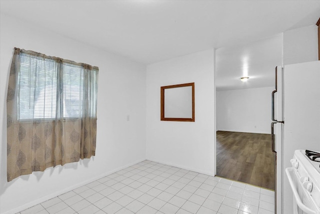 2407 W William St, Champaign, IL 61821 - empty room with tile patterned floors