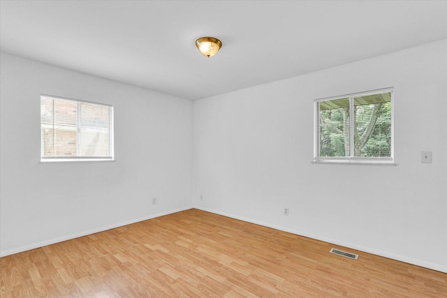 2407 W William St, Champaign, IL 61821 - empty room with light wood-style flooring