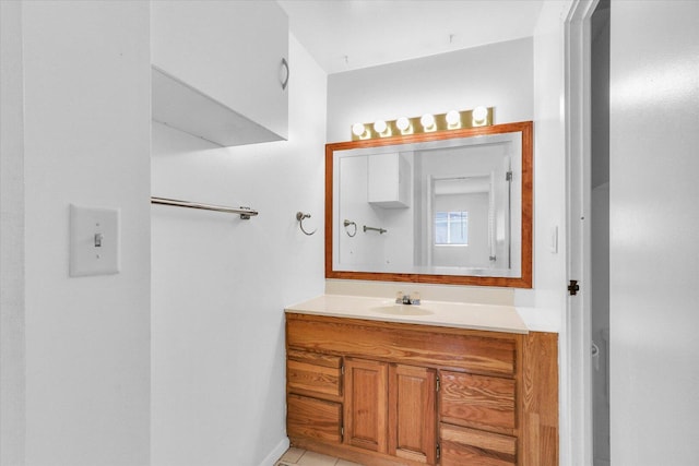 2407 W William St, Champaign, IL 61821 - bathroom featuring vanity and tile patterned flooring