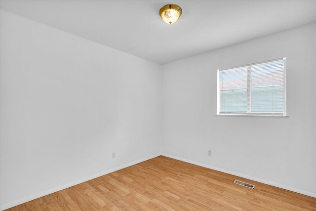 2407 W William St, Champaign, IL 61821 - empty room with light wood-style floors