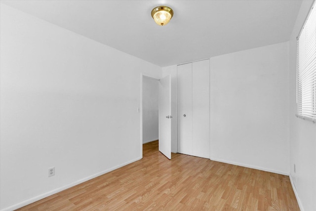2407 W William St, Champaign, IL 61821 - spare room featuring light wood-style floors