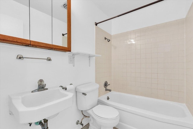 2407 W William St, Champaign, IL 61821 - bathroom featuring toilet and bathtub / shower combination