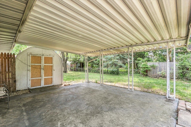 2407 W William St, Champaign, IL 61821 - fenced backyard featuring a patio and a storage shed