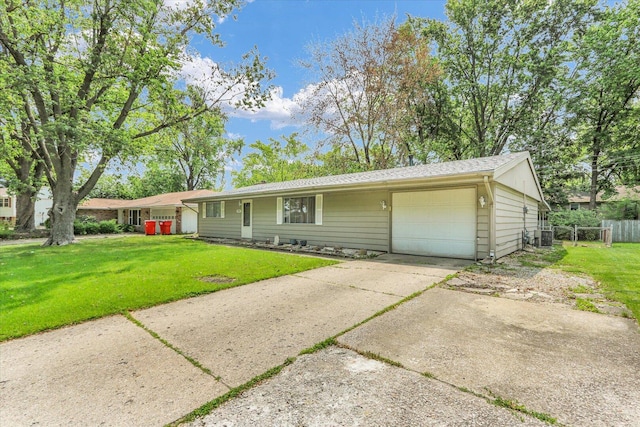 2407 W William St, Champaign, IL 61821 - ranch-style home with a garage and concrete driveway
