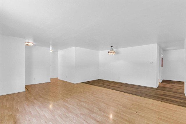 2407 W William St, Champaign, IL 61821 - spare room featuring light wood-style flooring