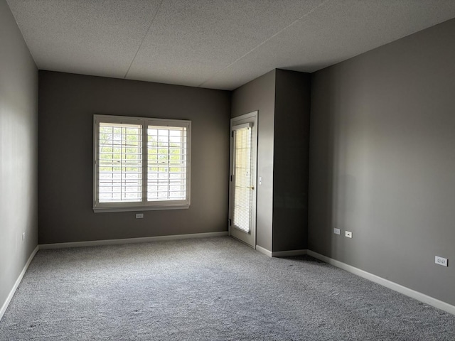 200 N Addison Ave Unit 505, Elmhurst, IL 60126 - carpeted empty room with a textured ceiling and baseboards