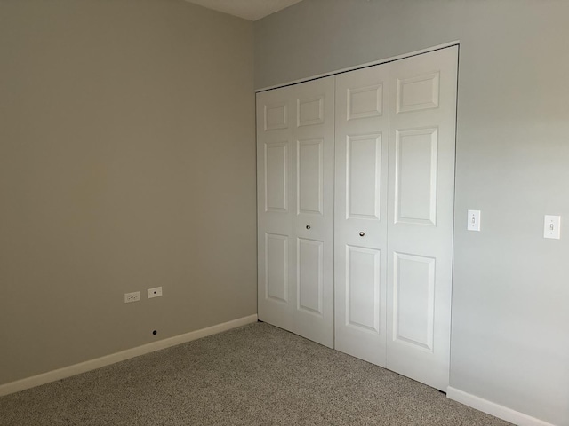 200 N Addison Ave Unit 505, Elmhurst, IL 60126 - unfurnished bedroom with carpet floors and a closet