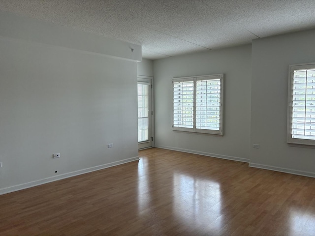 200 N Addison Ave Unit 505, Elmhurst, IL 60126 - unfurnished room with wood finished floors and a textured ceiling