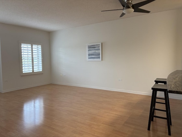 200 N Addison Ave Unit 505, Elmhurst, IL 60126 - unfurnished room featuring ceiling fan, light wood finished floors, and a textured ceiling