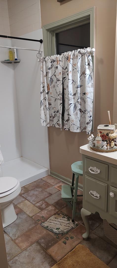 2S720 Nelson Lake Rd, Batavia, IL 60510 - bathroom featuring a shower stall and stone finish floors