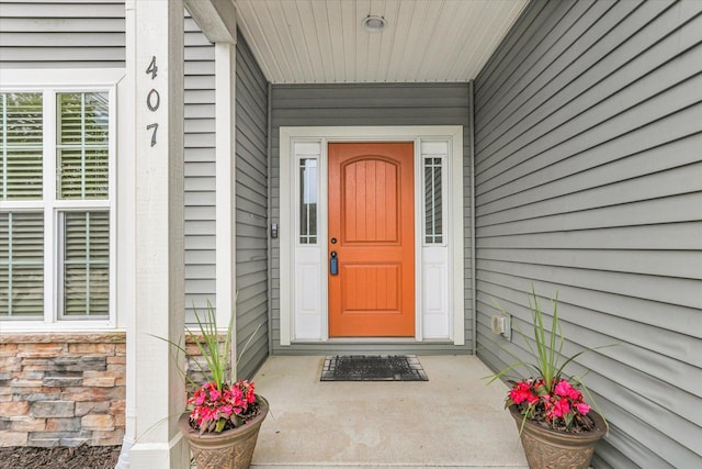 407 Banbury Ln, Savoy, IL 61874 - property entrance featuring covered porch