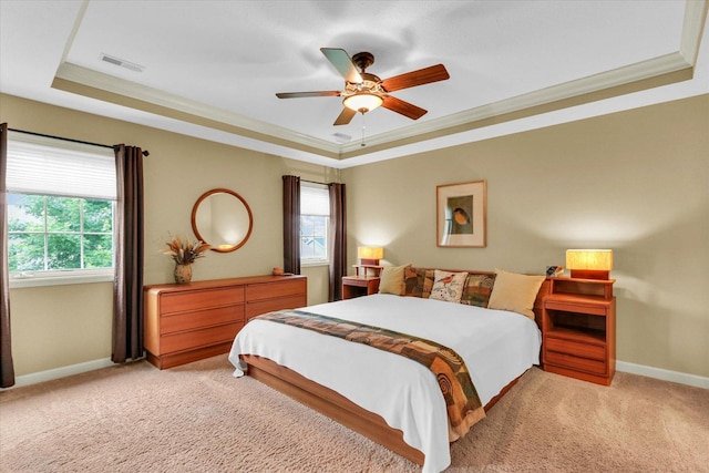 407 Banbury Ln, Savoy, IL 61874 - bedroom with light colored carpet, multiple windows, crown molding, and a tray ceiling