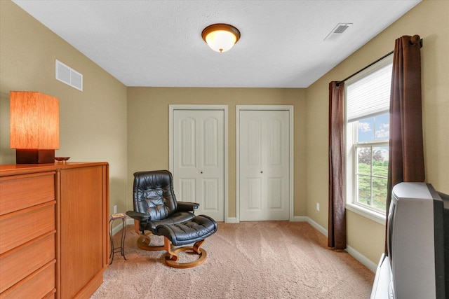407 Banbury Ln, Savoy, IL 61874 - living area featuring light carpet and baseboards