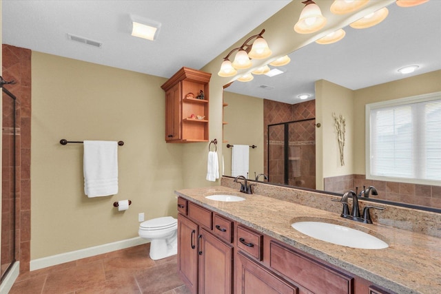 407 Banbury Ln, Savoy, IL 61874 - bathroom featuring a shower stall and double vanity