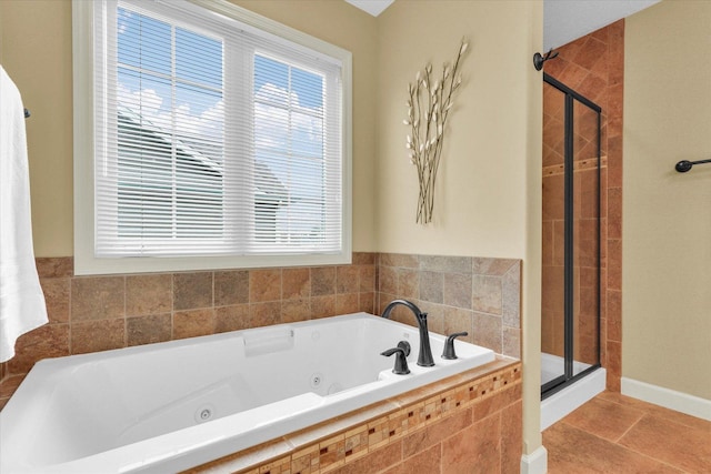 407 Banbury Ln, Savoy, IL 61874 - full bathroom featuring a stall shower, plenty of natural light, and a tub with jets