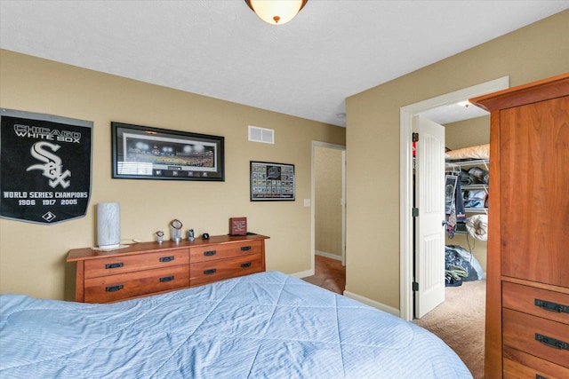 407 Banbury Ln, Savoy, IL 61874 - carpeted bedroom with a spacious closet and a closet