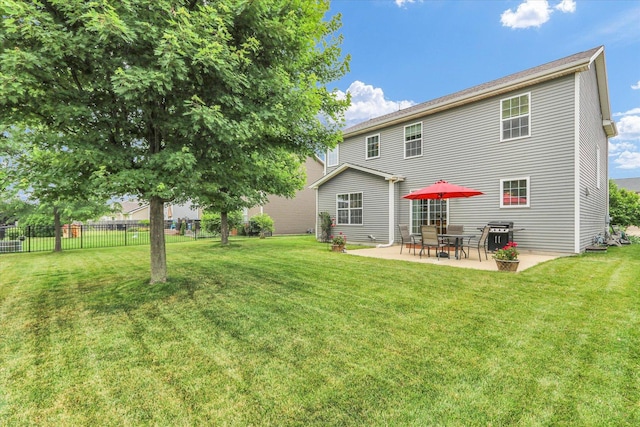 407 Banbury Ln, Savoy, IL 61874 - rear view of property with a patio