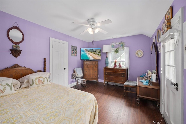 233 S Elmwood Dr, Aurora, IL 60506 - bedroom featuring multiple windows, wood finished floors, lofted ceiling, a ceiling fan, and baseboards