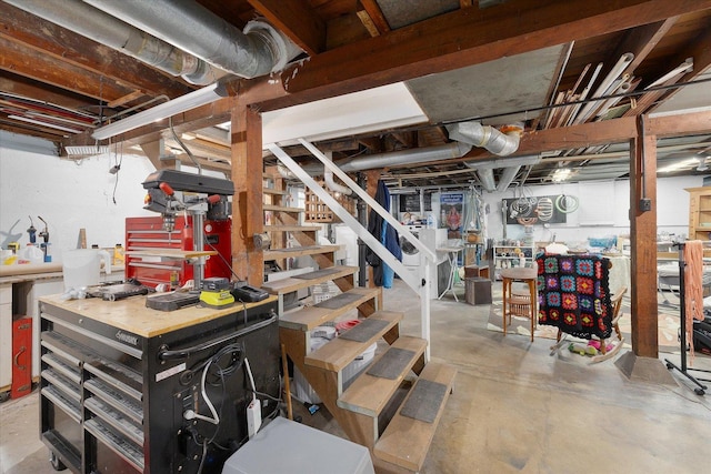 233 S Elmwood Dr, Aurora, IL 60506 - unfinished below grade area with a workshop area and stairway