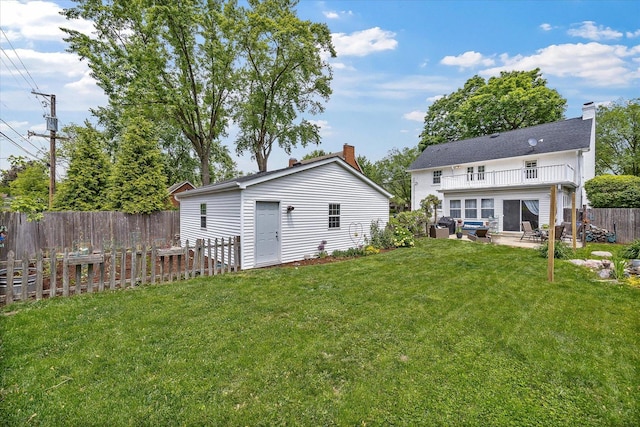 233 S Elmwood Dr, Aurora, IL 60506 - rear view of house with a patio area and a balcony