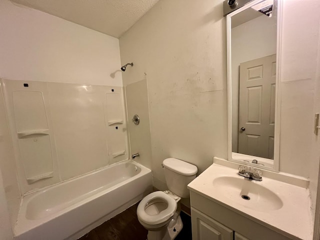 1205 W Beech St, Urbana, IL 61801 - bathroom with vanity, bathtub / shower combination, and a textured ceiling