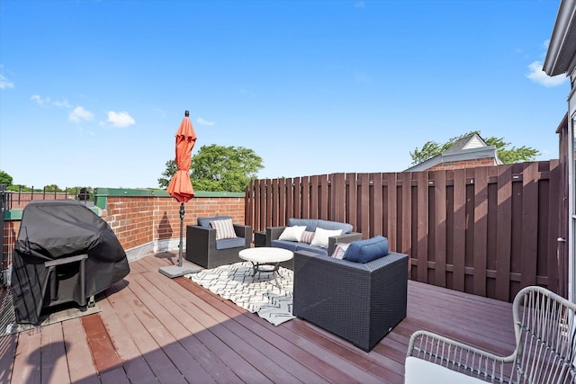 2500 N Seminary Ave Unit 4W, Chicago, IL 60614 - wooden deck with outdoor lounge area and a grill