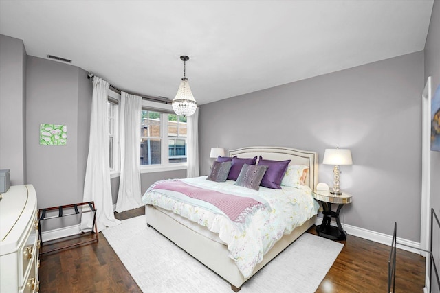 2500 N Seminary Ave Unit 4W, Chicago, IL 60614 - bedroom with wood finished floors and a chandelier